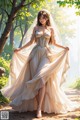 A woman in a wedding dress standing in a forest.